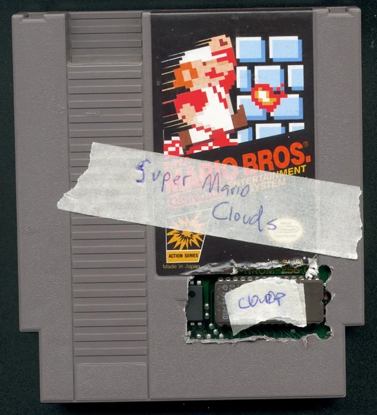 File:Mario-clouds-2002-001-cartridge-2-database-ih.webp